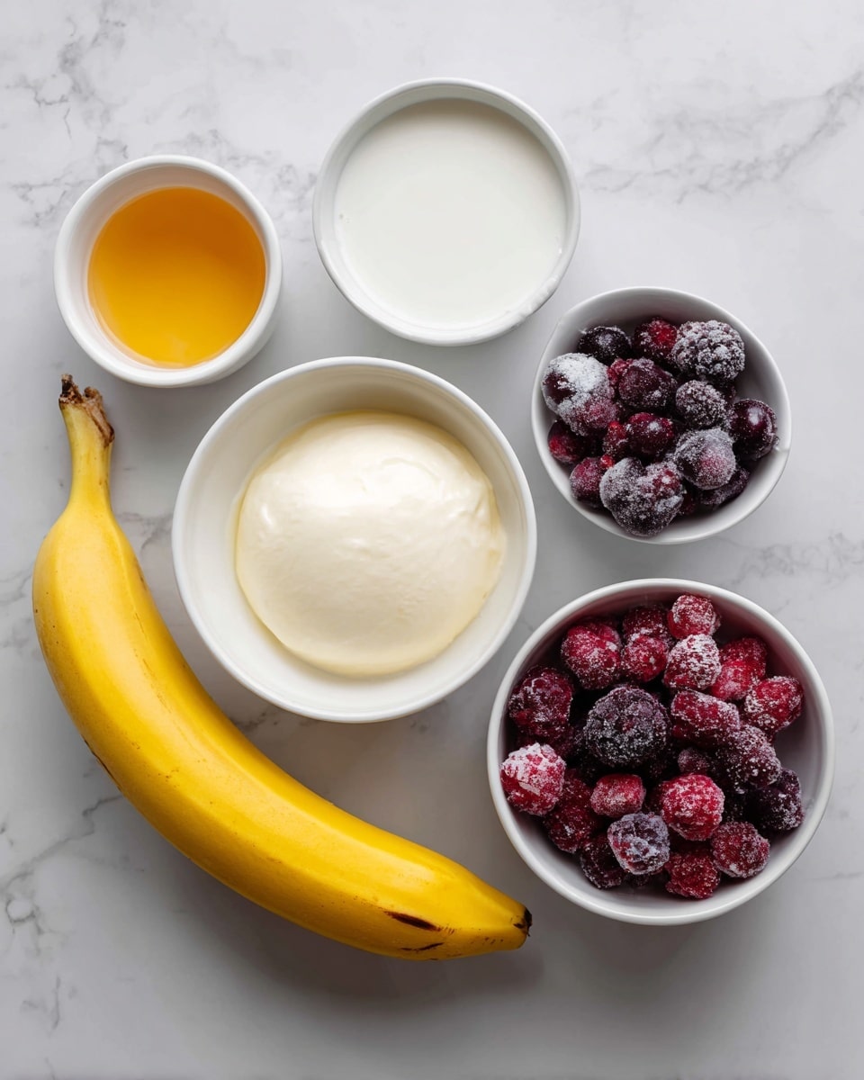 The image shows a simple arrangement of ingredients on a white marbled surface: a ripe yellow banana with a small brown spot lies at the bottom, a white bowl filled with a thick white substance placed above it; to the right, a round white bowl full of frozen mixed berries, mostly dark purple and red, some covered lightly with frost; above the banana and to the left, a small white bowl of golden honey with a smooth shiny texture; and to the left of the honey bowl, a white container holding a white liquid, possibly milk or cream. Photo taken with an iphone --ar 4:5 --v 7
