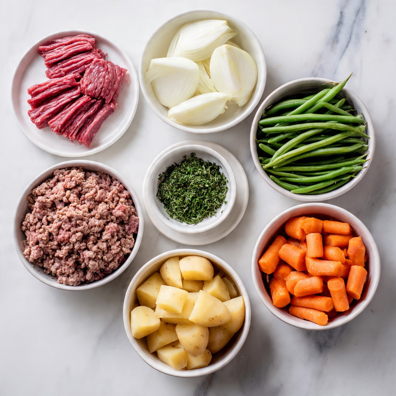 Seven white plates and bowls are arranged on a white marbled surface. Top left has thin slices of red meat neatly spread. Top center holds large white onion pieces. Top right has green beans stacked neatly. Middle left contains light brown raw ground meat. Middle center is a small bowl filled with chopped green herbs. Middle right holds smooth peeled carrot slices. Bottom center shows a bigger bowl filled with peeled potato chunks. A woman's hand holds a small bowl in the center. Photo taken with an iphone --ar 4:5 --v 7