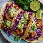 Grilled Shrimp Tacos with Lime Crema and Cabbage Slaw Recipe