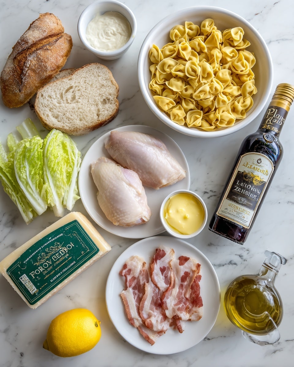 A spread of ingredients is arranged on a white marbled surface, including a white bowl filled with bright yellow tortellini pasta, evenly layered to fill the bowl. To the right, two raw chicken pieces with a smooth, pale pink texture sit on a white plate. Above the chicken is a slice of light brown bread with a soft, porous texture. On the left, thin strips of raw bacon with pink and white fat streaks lie flat on a white plate. Nearby, a small green romaine lettuce head with tightly packed leaves is placed upright. Scattered around are small white bowls with creamy white sauce, pale yellow mustard, and a small clear glass container holding golden olive oil. A bottle of Worcestershire sauce with an orange label and a triangular block of Parmigiano Reggiano cheese in green packaging are also part of the layout. A yellow lemon sits close to the center bottom. The whole scene is neat and bright, photo taken with an iphone --ar 4:5 --v 7