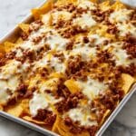 Oven-Baked Loaded Nachos with Cheese, Black Beans, and Fresh Toppings Recipe