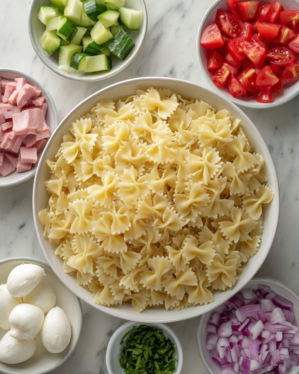 This image shows six small white bowls arranged around one large white bowl filled with uncooked farfalle pasta. The large bowl with the pale yellow pasta sits in the center on a white marbled surface. Surrounding it are small bowls each holding different fresh ingredients: bright red diced tomatoes, green cucumber chunks, pink pieces of ham, small white mozzarella balls, diced red bell peppers, and finely chopped red onions. There is also a small bowl with chopped green basil leaves. The colors are fresh and vibrant, with the bowls neatly placed to show variety. Photo taken with an iphone --ar 4:5 --v 7