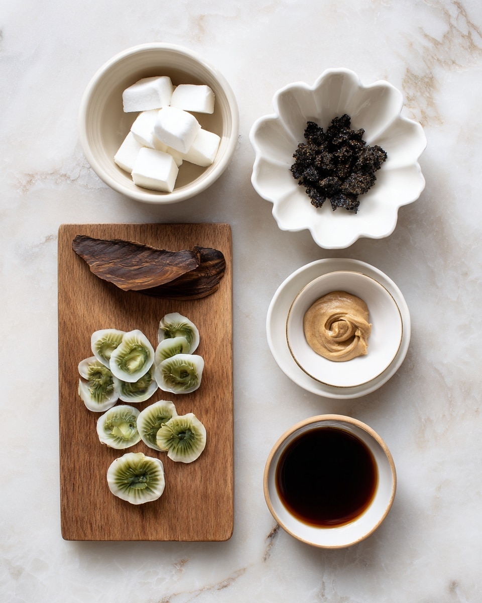 The image shows five small white bowls and one wooden board arranged on a white marbled surface. The top left bowl holds small white cubes that look soft and smooth. To the right, a smaller white scalloped bowl is filled with small black clumps that have a rough texture. Below, a small white bowl contains a light brown creamy paste with a smooth surface. Near the bottom left, a wooden board holds many small round slices of green vegetables with a fresh look. In the bottom center, a tiny white bowl contains dark brown liquid with a shiny surface. To the far left, a dark brown dry piece with a rough, slightly curved appearance lies on the marble surface. photo taken with an iphone --ar 4:5 --v 7