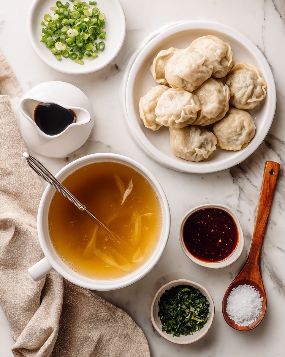 A white bowl filled with a warm golden broth sits at the bottom of the image, with a silver whisk partially submerged in it. Above it, a white bowl holds several round, lightly browned dumplings stacked on top of each other. To the left, there is a white plate with chopped green onions and next to it, a small white jug filled with dark soy sauce. On the right side, there is a small wooden spoon with white salt and two small bowls below it, one with green chopped herbs and the other with dark red sauce. Everything is placed on a white marbled surface with a beige cloth partially visible on the bottom left. Photo taken with an iphone --ar 4:5 --v 7