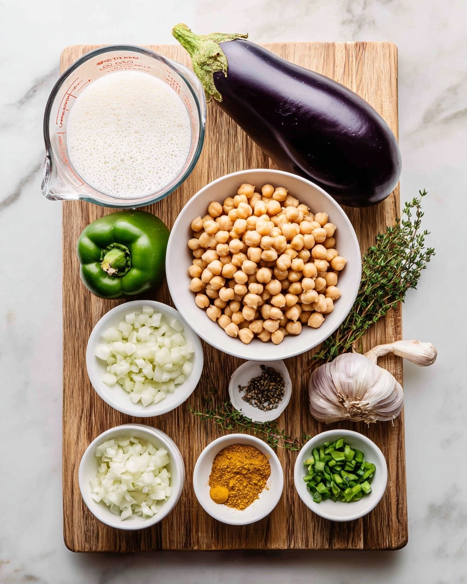 The image shows a wooden board with various ingredients neatly arranged on a white marbled surface. In the center, there is a white bowl full of round, light brown chickpeas. Above the bowl, a large smooth dark purple eggplant rests on the board. To the left of the chickpeas, a clear glass measuring cup filled with a foamy white liquid is placed. Surrounding these main items, there are several small white bowls; one contains chopped white onions, another has chopped green onions, one holds minced garlic, a small one with a bright yellow powder (likely curry powder), and one with finely grated ginger. A green pepper sits beside these bowls, and sprigs of thyme lie near the bottom edge of the board. Photo taken with an iphone --ar 4:5 --v 7